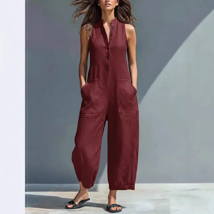 Button-front sleeveless loose-fit jumpsuit with a stand collar