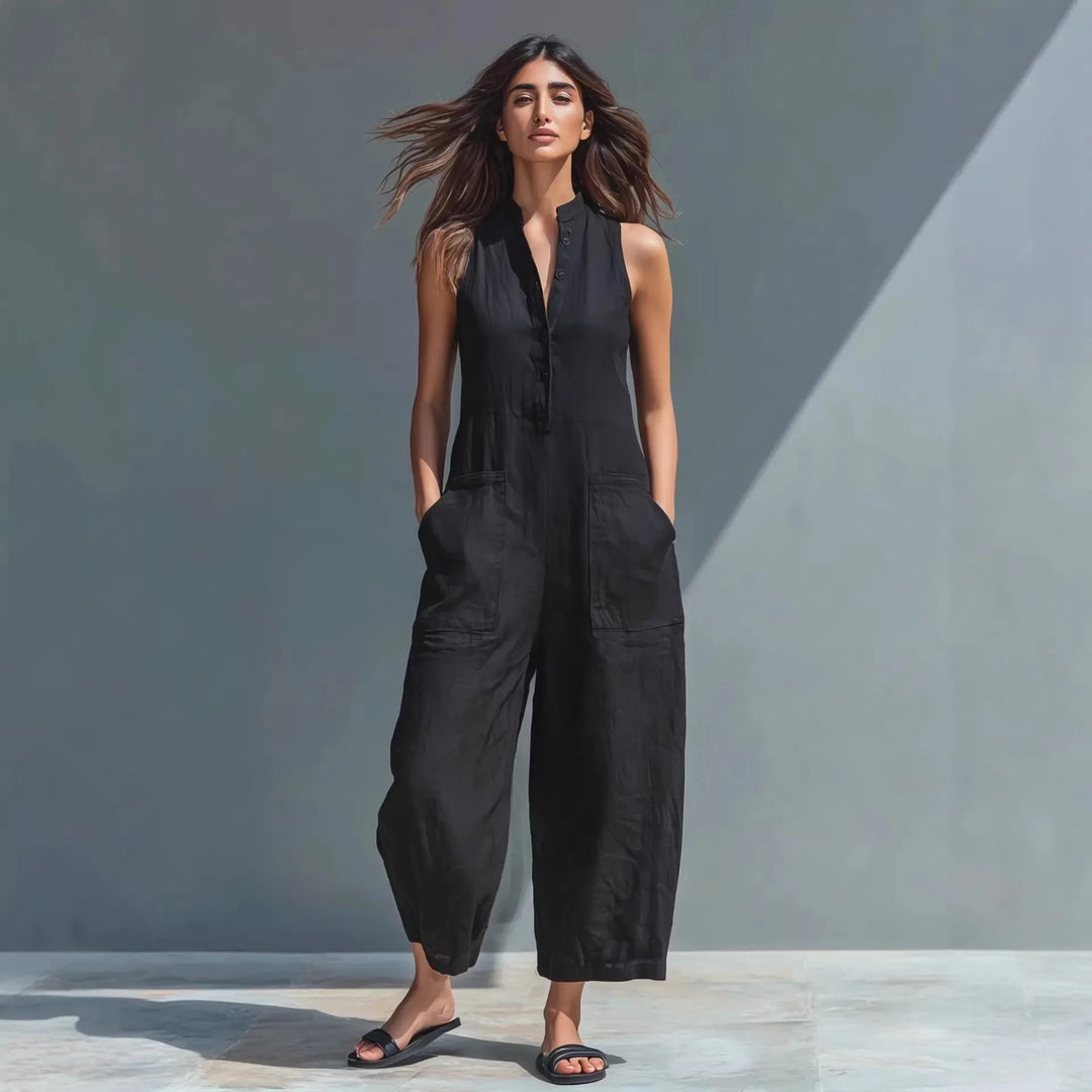 Button-front sleeveless loose-fit jumpsuit with a stand collar