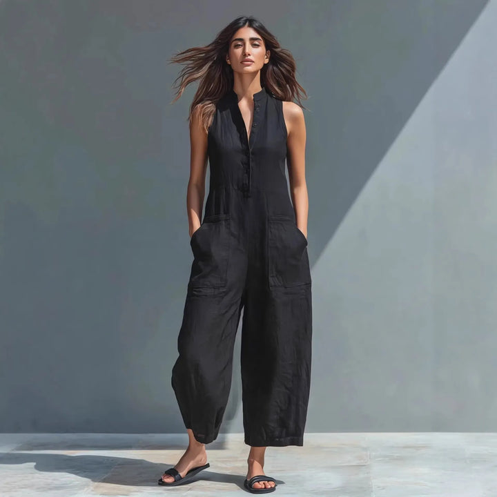 Button-front sleeveless loose-fit jumpsuit with a stand collar